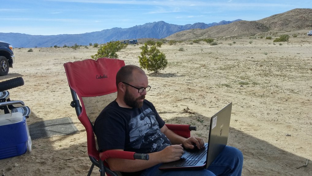 Working on tax return in the desert
